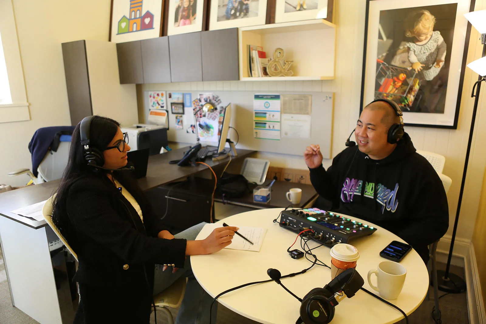 Pegah Faed recording Beyond the Fog podcast with host Jae Yee